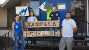 CAP Services’ Fresh Start Program participants pose with the Waupaca Eco-Park sign outside the CAP Services offices in Waupaca. A public dedication celebration will be held Sept. 10 at Eco-Park, which is located on city-owned parkland adjacent to the Eastgate Estates subdivision on the city’s east side.