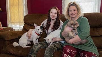 Colette and Brielle at home with their pets
